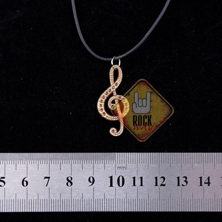 Кулон Скрипковий ключ з візерунком (бронзовий колір) Кулон Скрипковий ключ з візерунком (бронзовий колір)